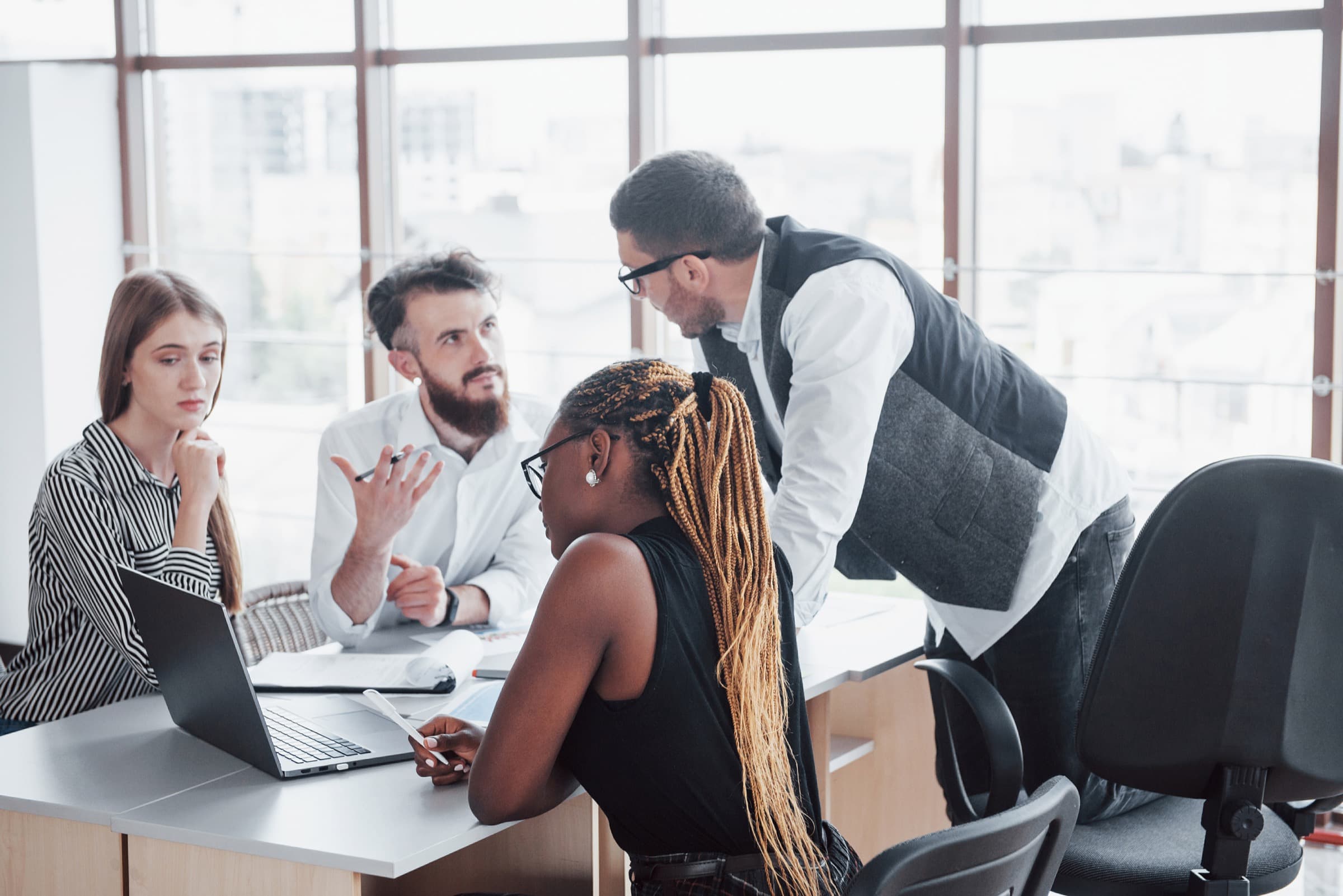 Professional appraisal workspace with property analysis materials